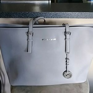 Michael Kors purse with dust cover